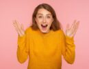 wow-oh-my-god-portrait-amazed-excited-ginger-girl-sweater-raising-hands-looking-camera-astonishment-wow-oh-my-171143127